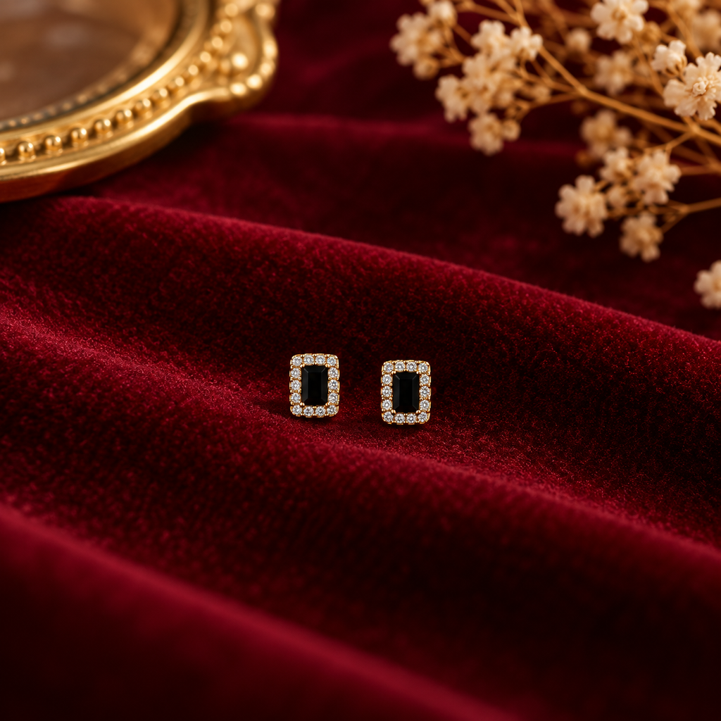 Gold & Black Halo Stud Earrings on velvet