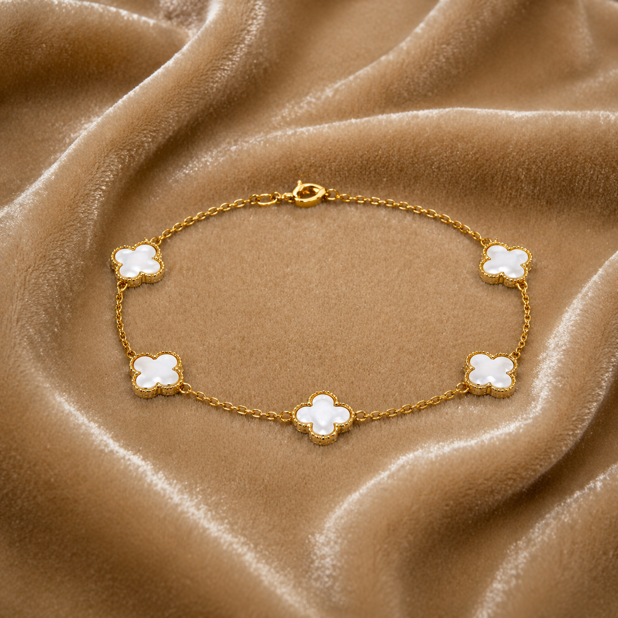 delicate gold bracelet white on velvet