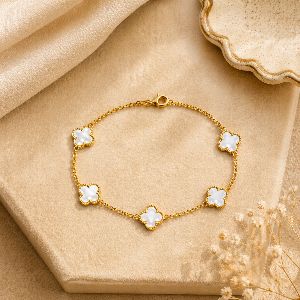 delicate gold bracelet white on flat