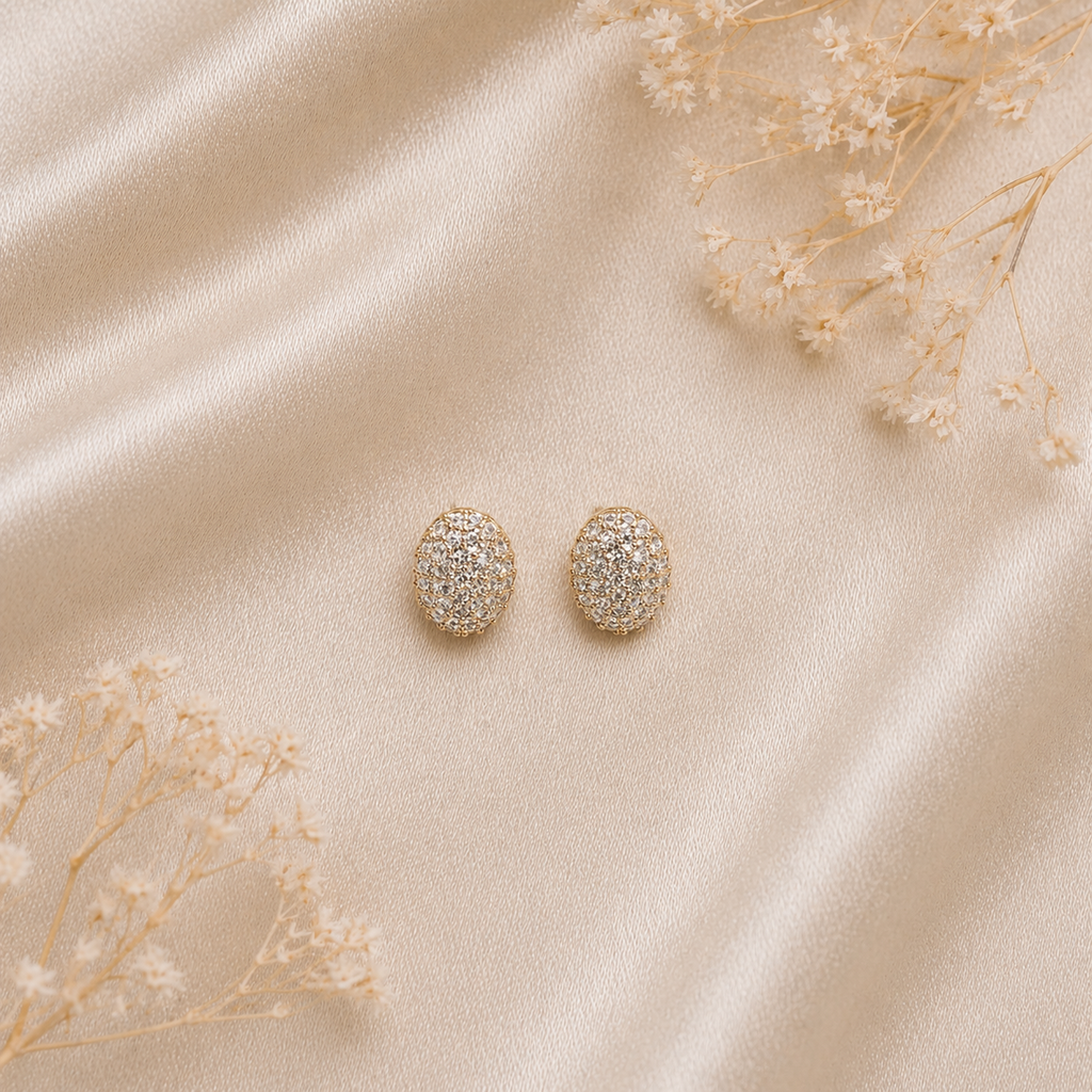 Statement shimmering stones stud earrings on satin