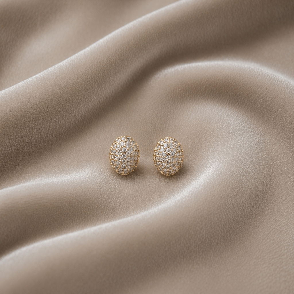 Statement shimmering stones stud earrings on velvet