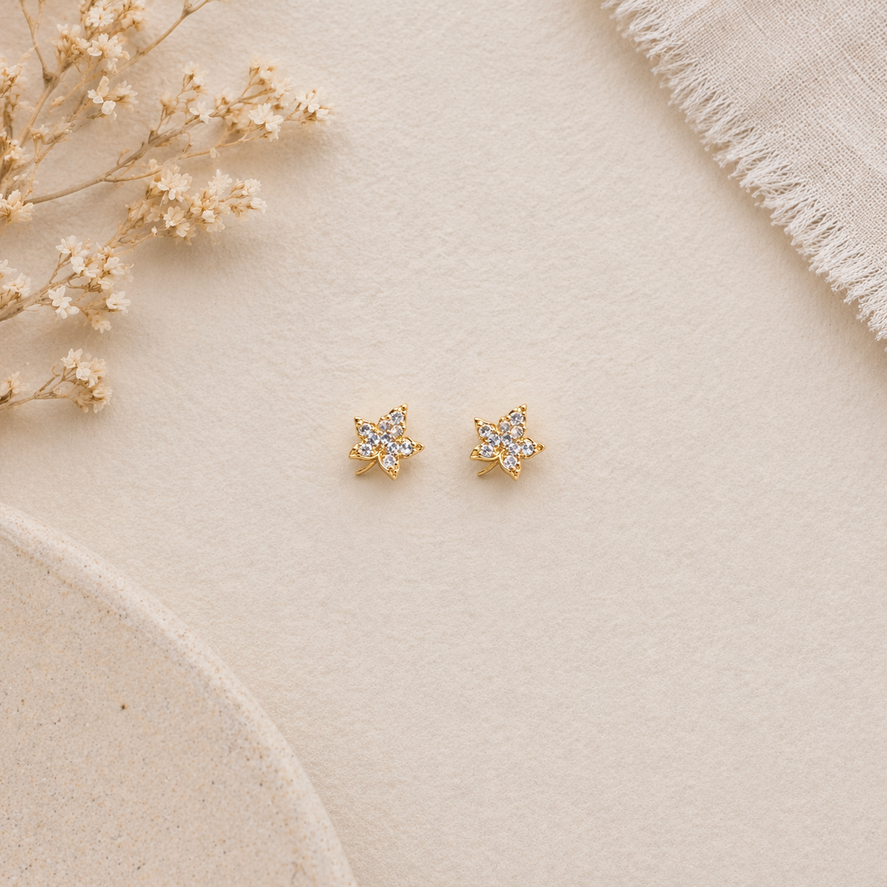 Maple leaf inspired design stud on marble