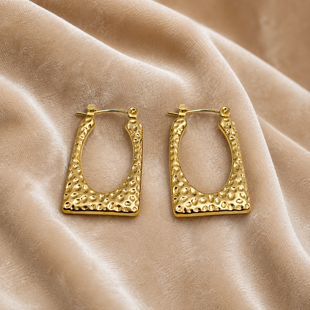 Square gold hoops on velvet