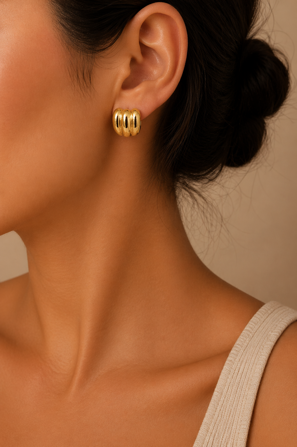 Gold ribbed stud earrings trial