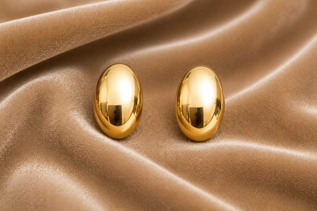 Oval stud earrings on velvet