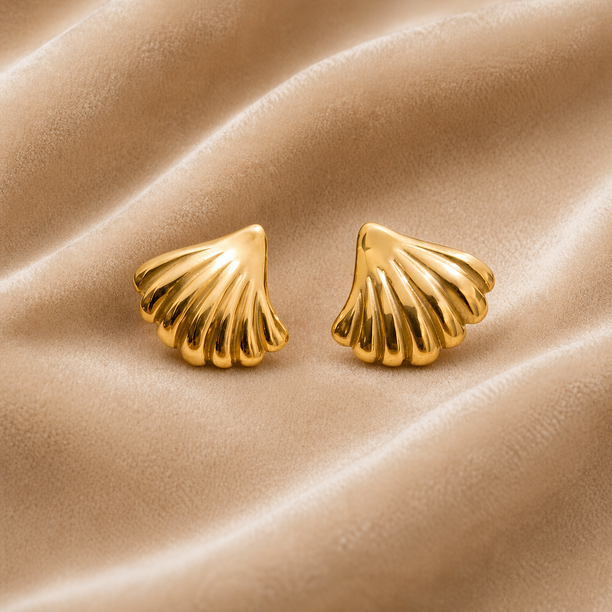 Shell stud earrings on velvet