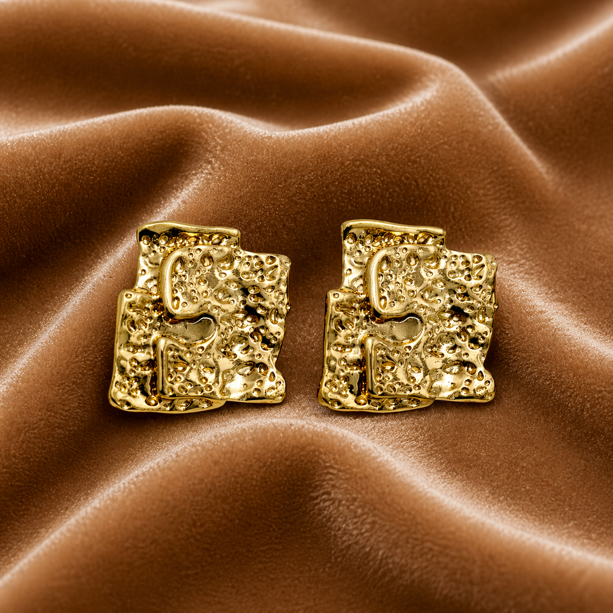 Modern abstract stud earrings on velvet