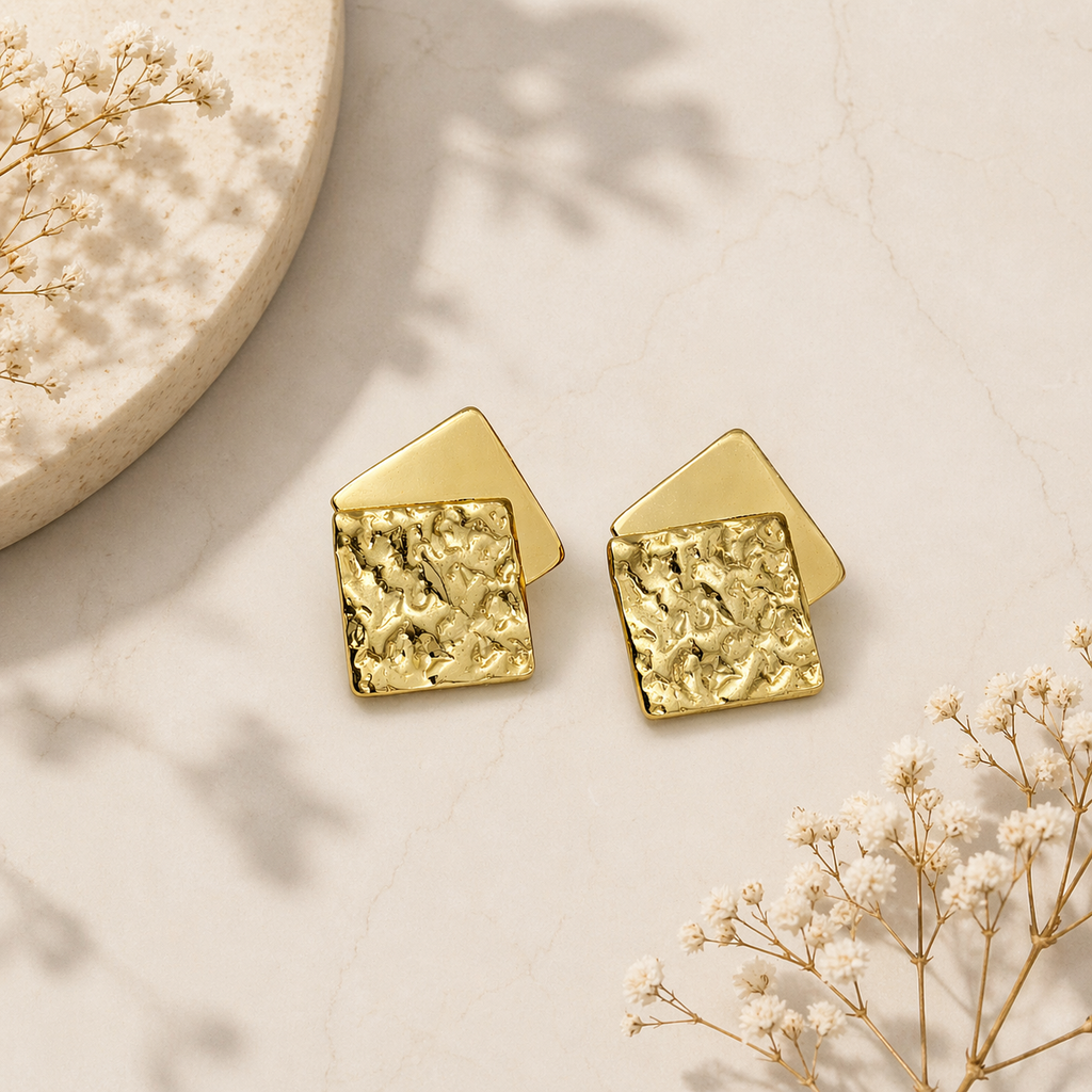  Layered square stud earrings on marble 