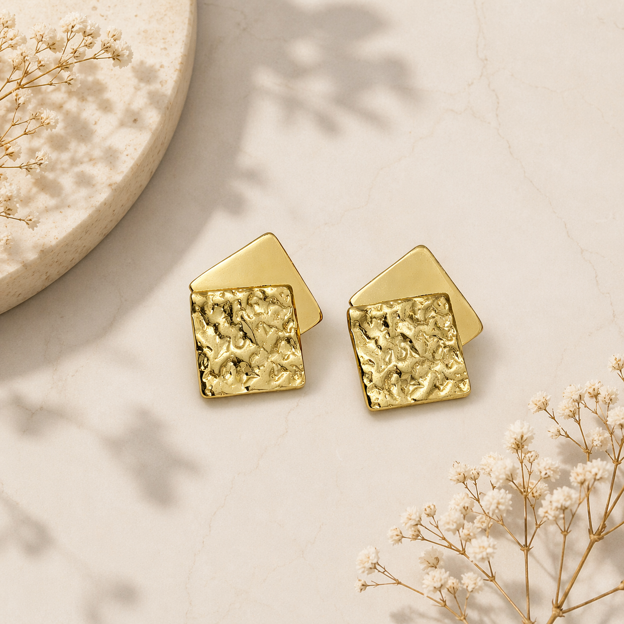  Layered square stud earrings on marble 