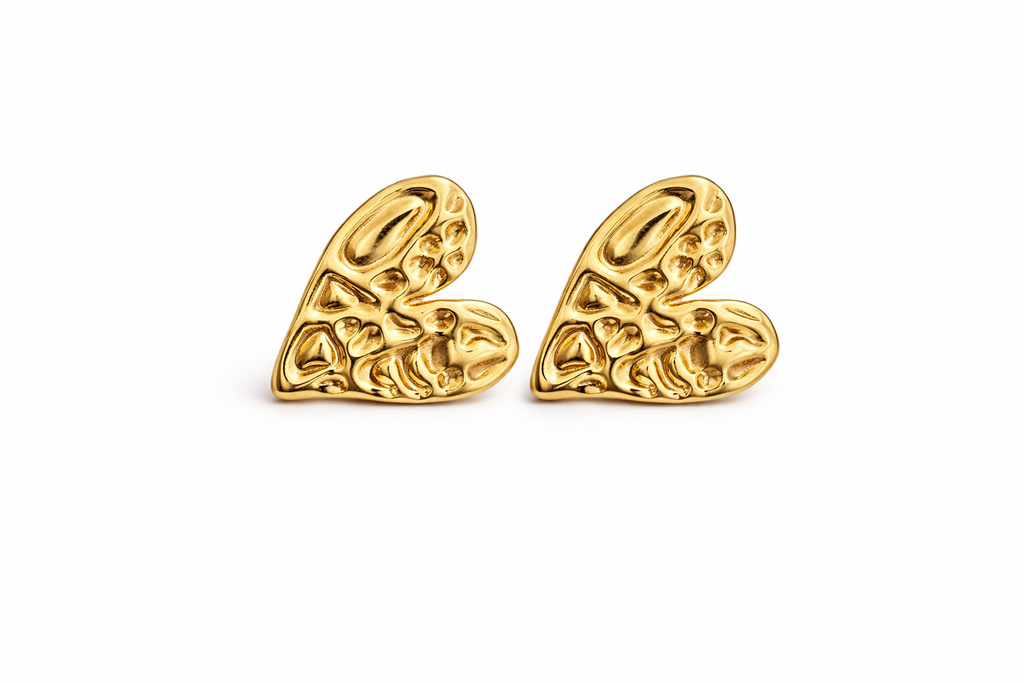 Gold heart shaped stud earrings