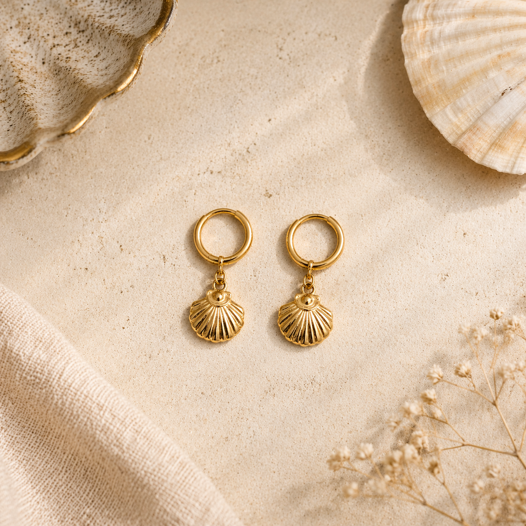 Sea shell earrings  on marble
