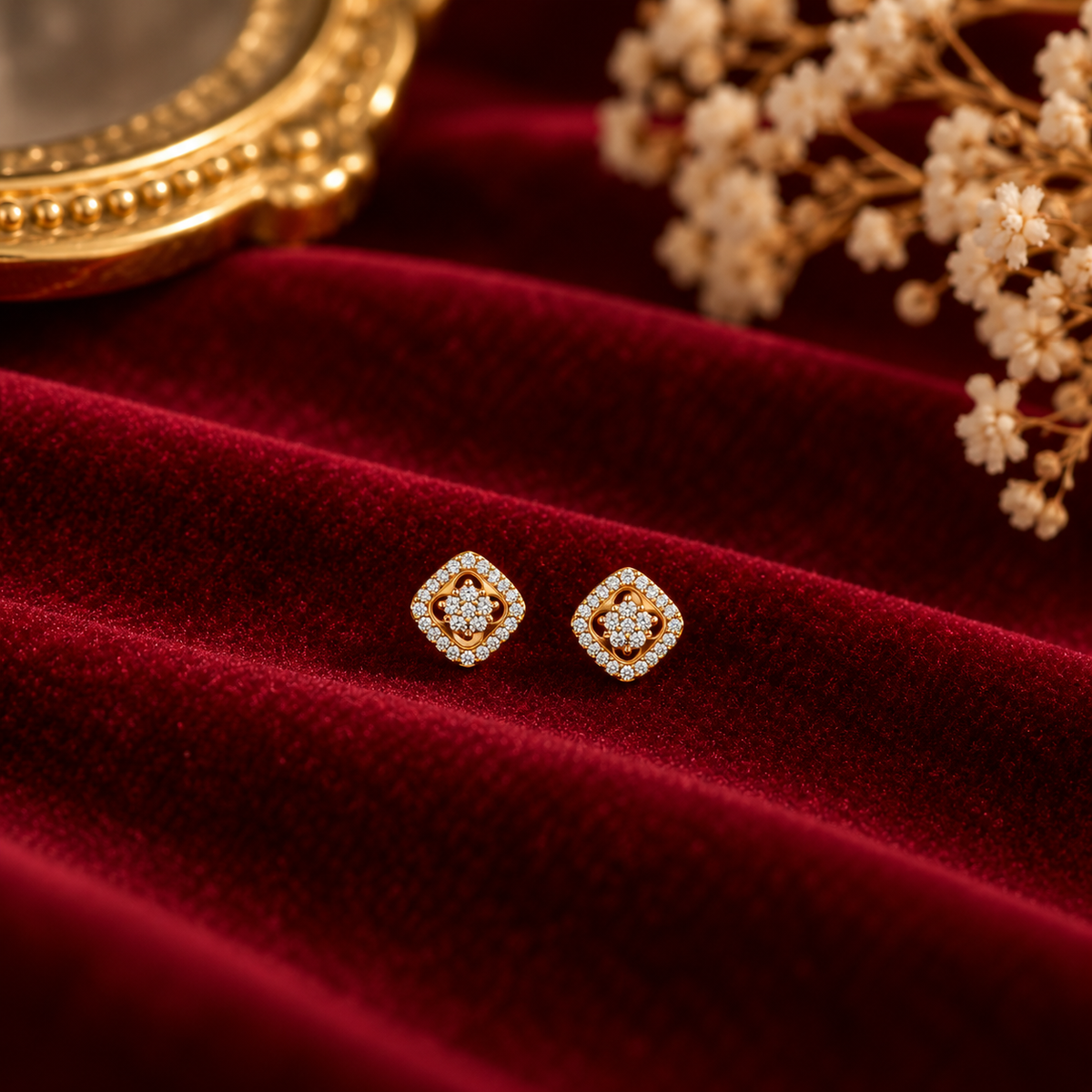 Elegant Gold Diamond Stud Earrings on velvet