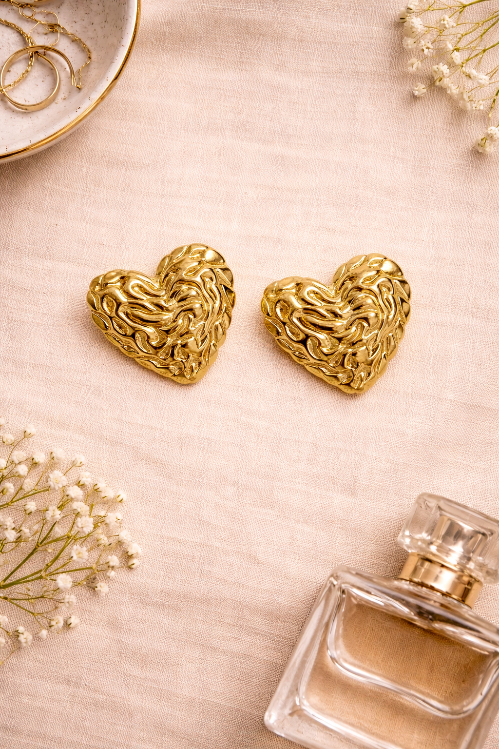 Gold heart earring