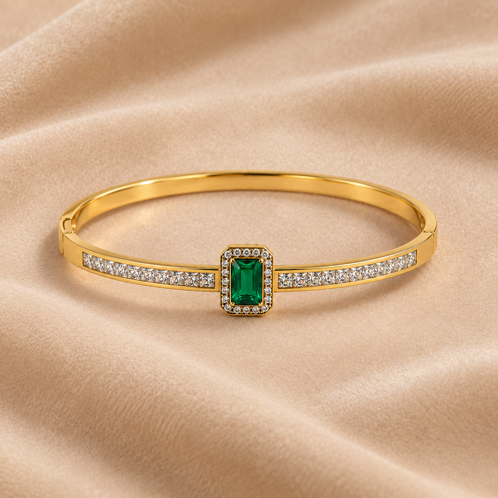 Emerald Green Crystal Gold-Tone Bangle Bracelet on velvet