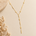 Gold Star Y-Lariat Necklace flat lay