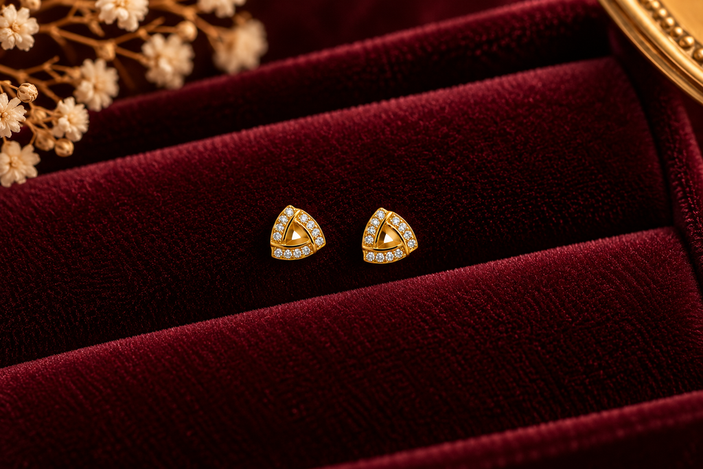 Triangular Gold Gemstone Stud Earrings on velvet