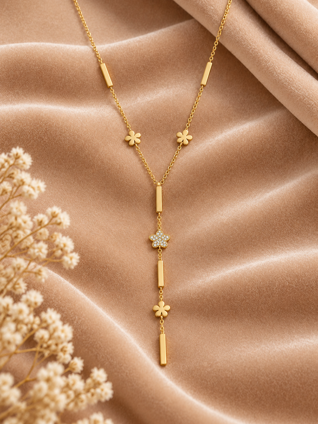  Gold Floral Y-Lariat Necklace on velvet
