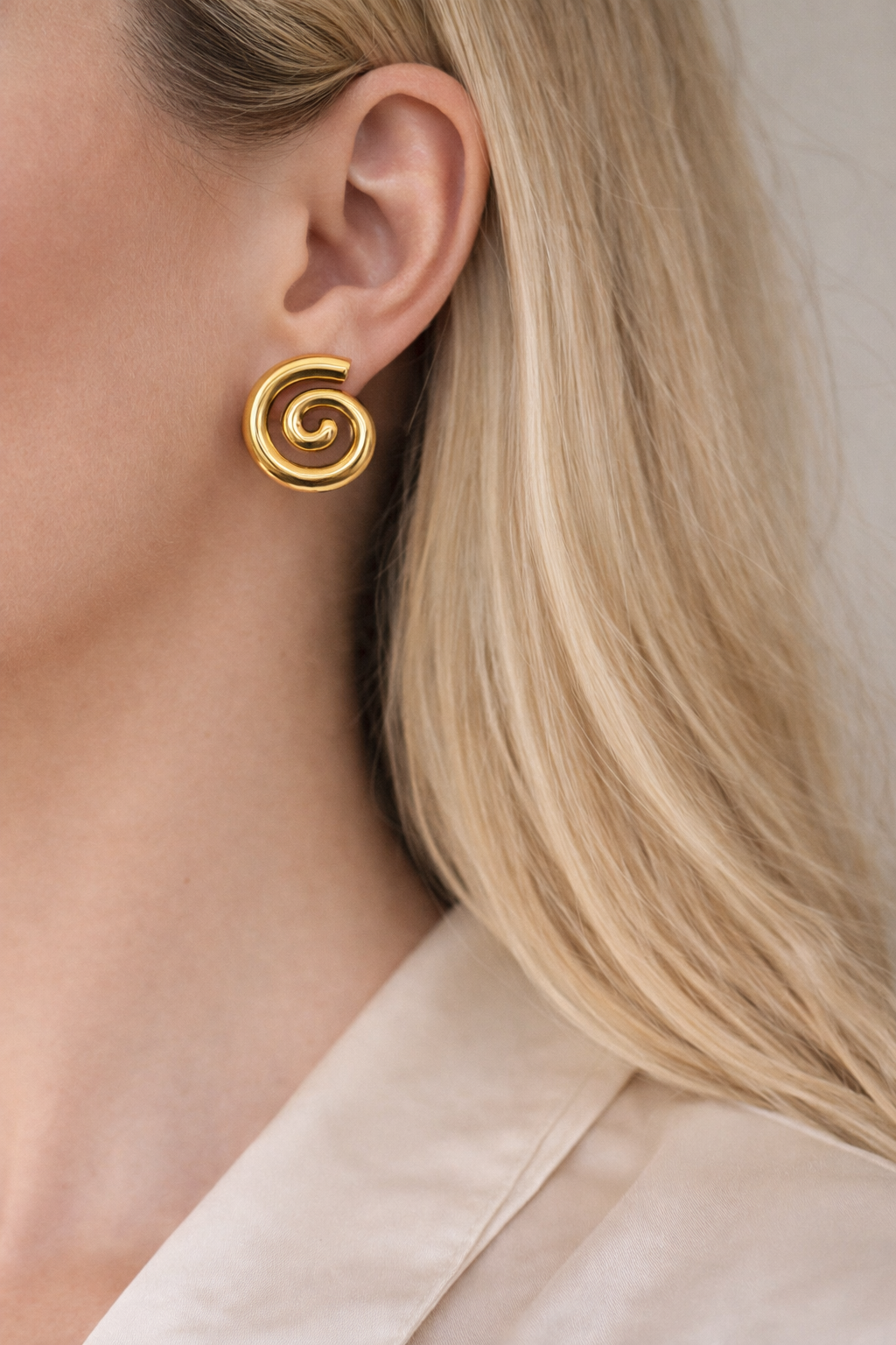 Gold spiral earrings trial