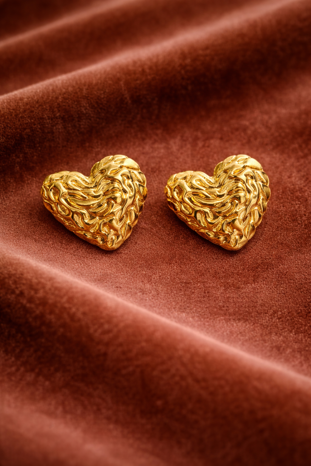 Gold heart earring
