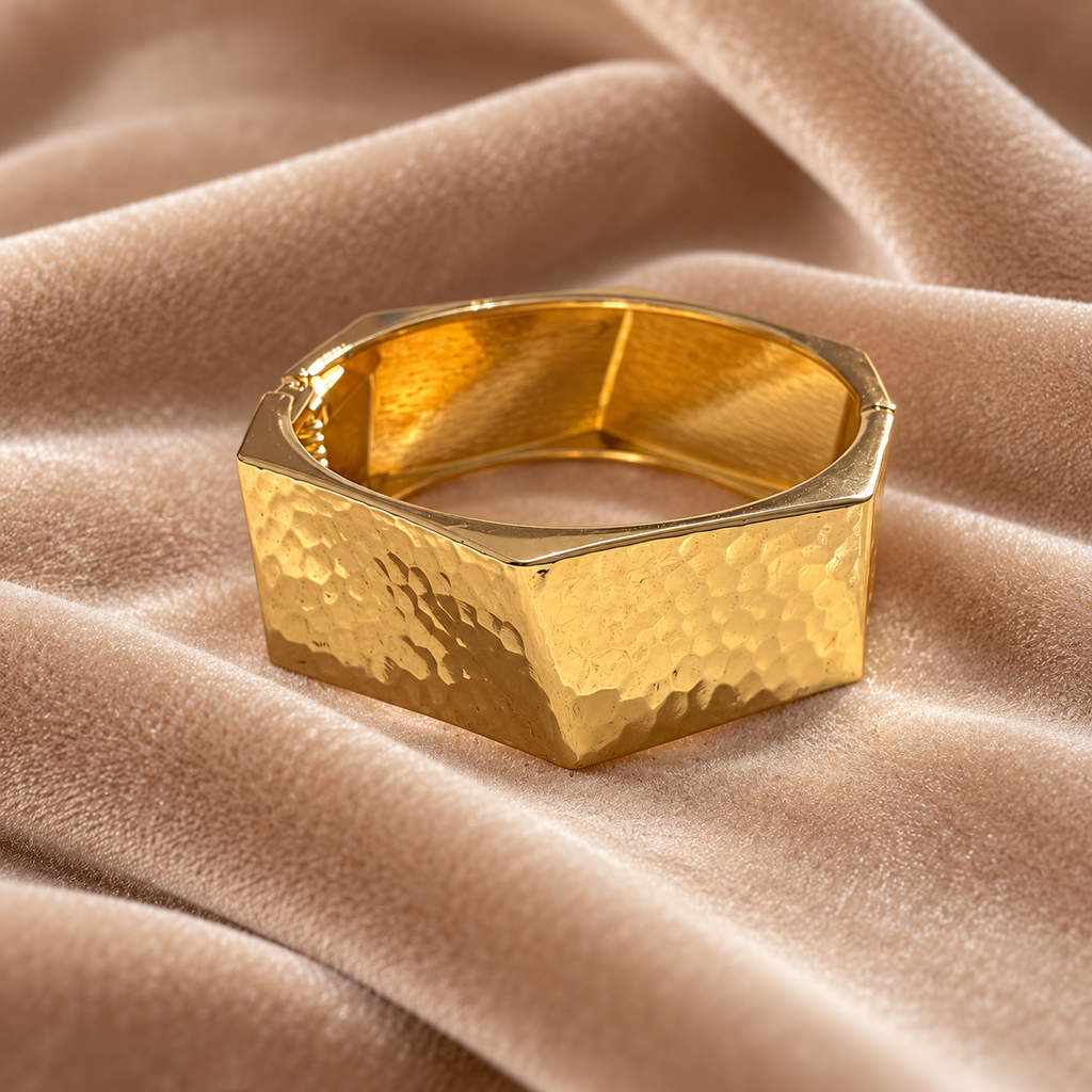 Hammered Gold Geometric Bangle on velvet