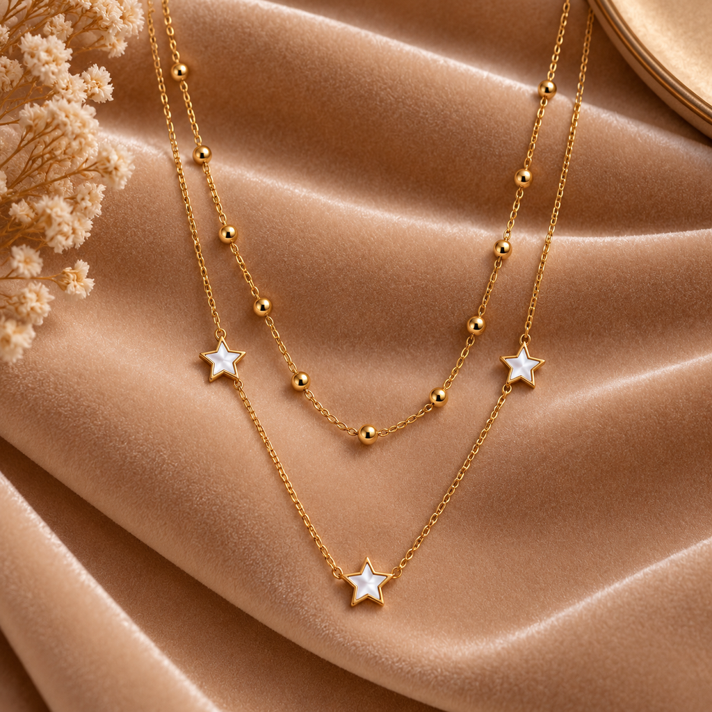 Layered Gold Star Necklace with Beaded Chain on velvet