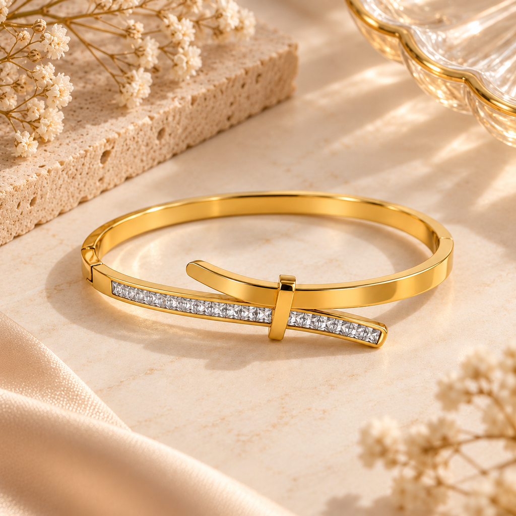 Luxury Gold-Tone Crystal Bangle Bracelet for Women on flat lay 